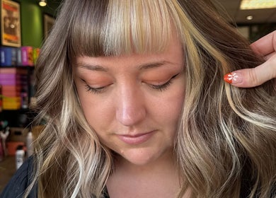Lauren Wingfield at Heartbreakers in Exeter, England, GB showcases chic hair highlights and styling.