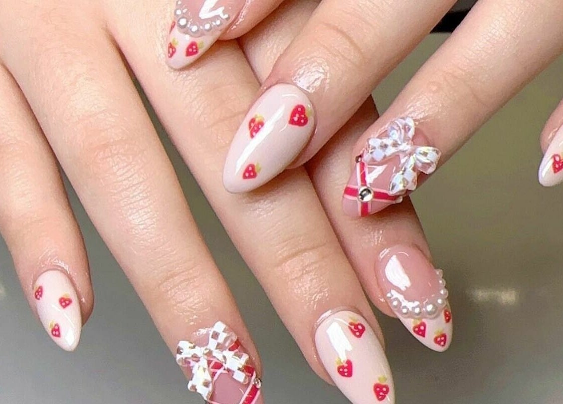 Detailed strawberry nail art design at Raizun Nail Spa, Fairfax, Virginia, US.