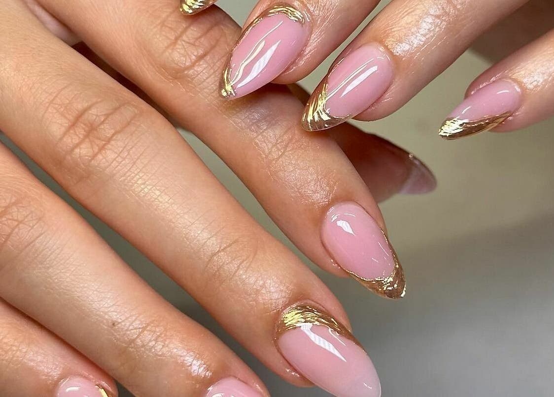 Elegant pink nails with gold accents at Raizun Nail Spa, Fairfax, Virginia, US.