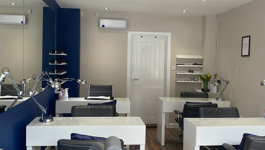 Modern interior of Lauren Jeffrey Nails in East Calder, Scotland, GB showcasing sleek nail stations.