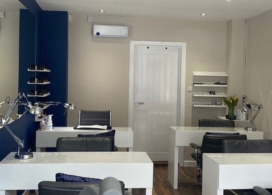 Modern interior of Lauren Jeffrey Nails in East Calder, Scotland, GB showcasing sleek nail stations.