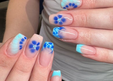 Elegant blue floral nail art at Lauren Jeffrey Nails, East Calder, Scotland, GB.