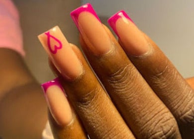 Elegant pink French manicure at Nails & Co. in Lekki, Lagos, NG.