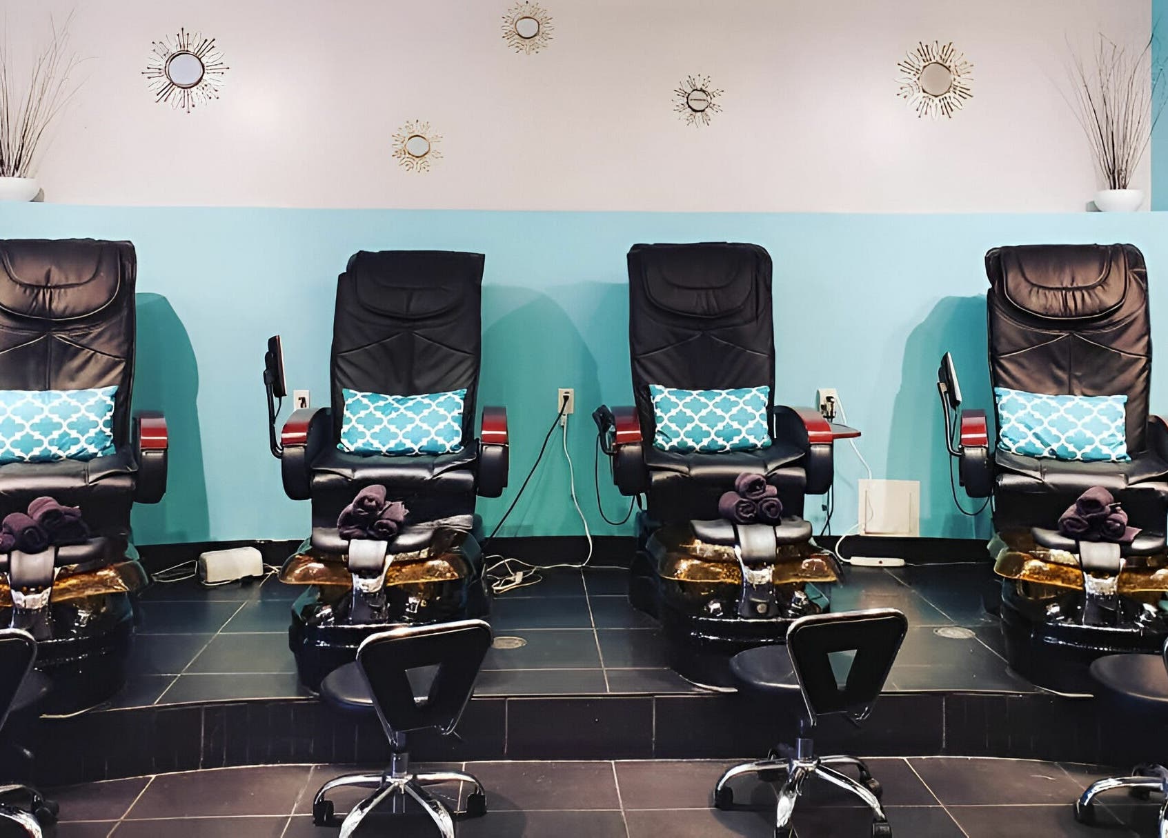 Luxe pedicure chairs at Posh Contessa Nails Spa in Burlington, Ontario, CA offer a relaxing spa experience.