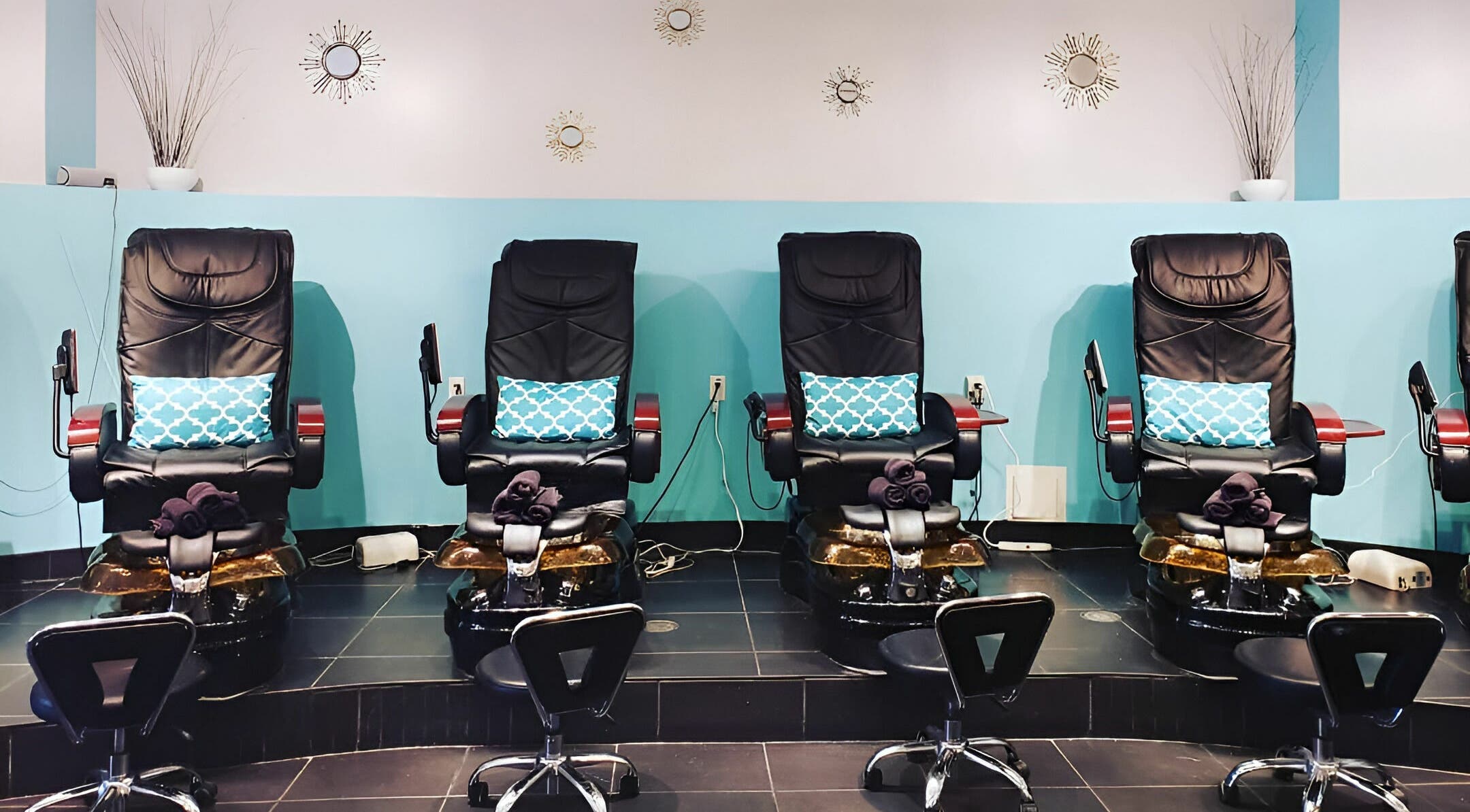 Luxe pedicure chairs at Posh Contessa Nails Spa in Burlington, Ontario, CA offer a relaxing spa experience.