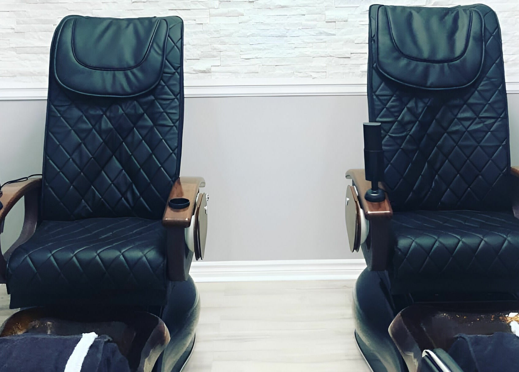Elegant pedicure chairs at Posh Contessa Nails Spa in Burlington, Ontario, CA provide ultimate relaxation.