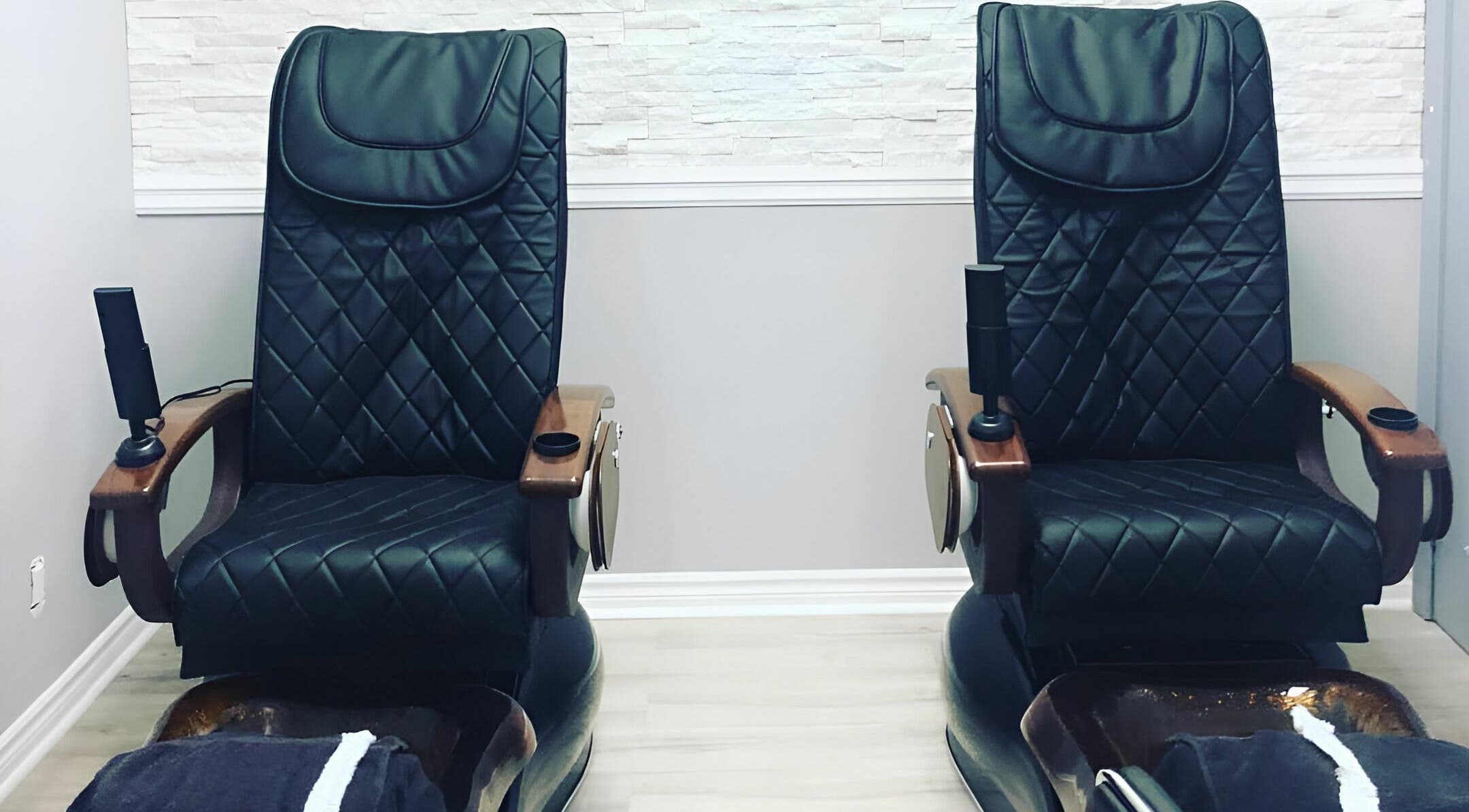 Elegant pedicure chairs at Posh Contessa Nails Spa in Burlington, Ontario, CA provide ultimate relaxation.