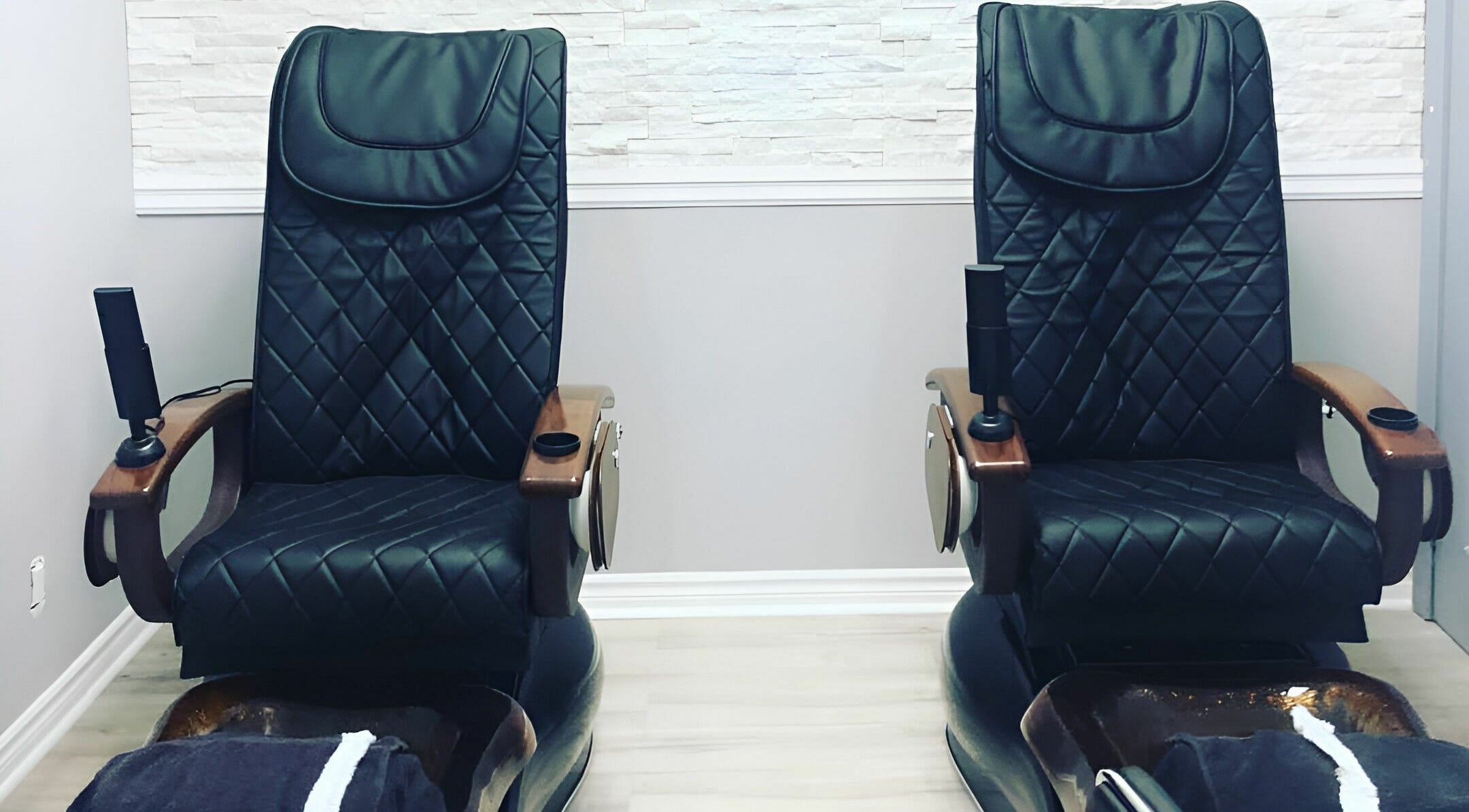 Elegant pedicure chairs at Posh Contessa Nails Spa in Burlington, Ontario, CA provide ultimate relaxation.