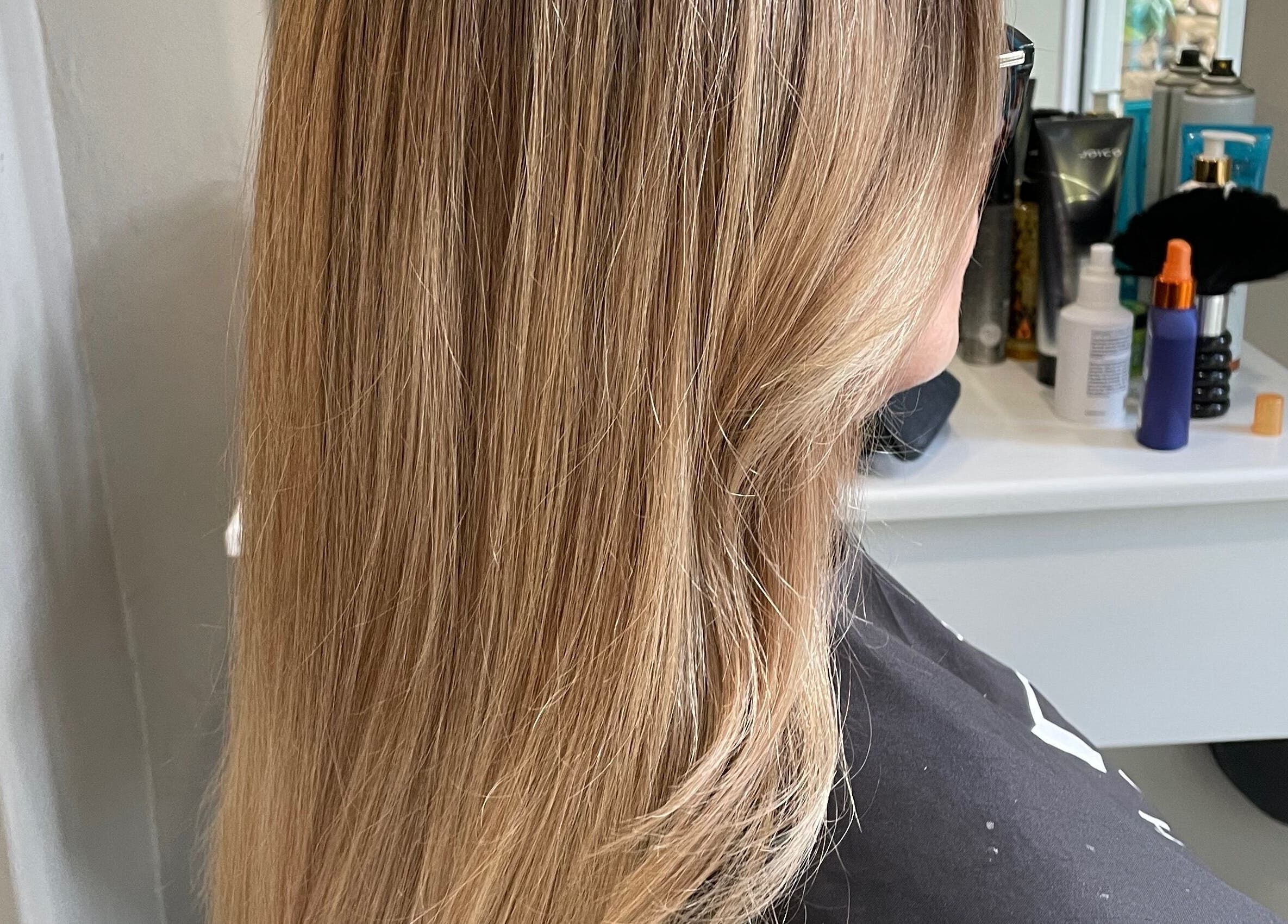 Blonde hair styled at Sherri Styles at 134 Upper Orange, Somerset West, Western Cape, ZA.