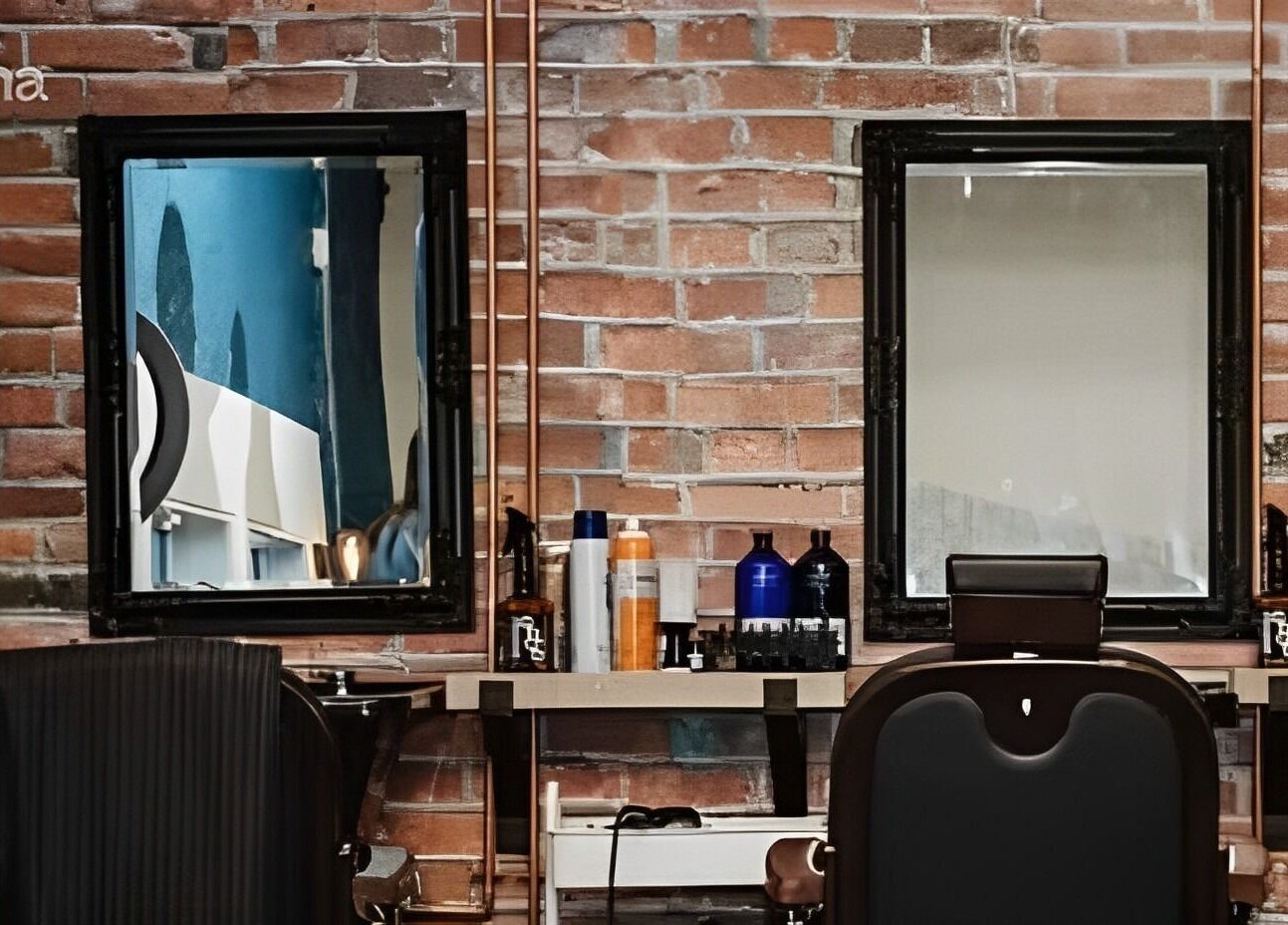 Chic urban barber station at Prohibition Barber & Bourbon Room, Canmore, Alberta, CA with exposed brick wall.
