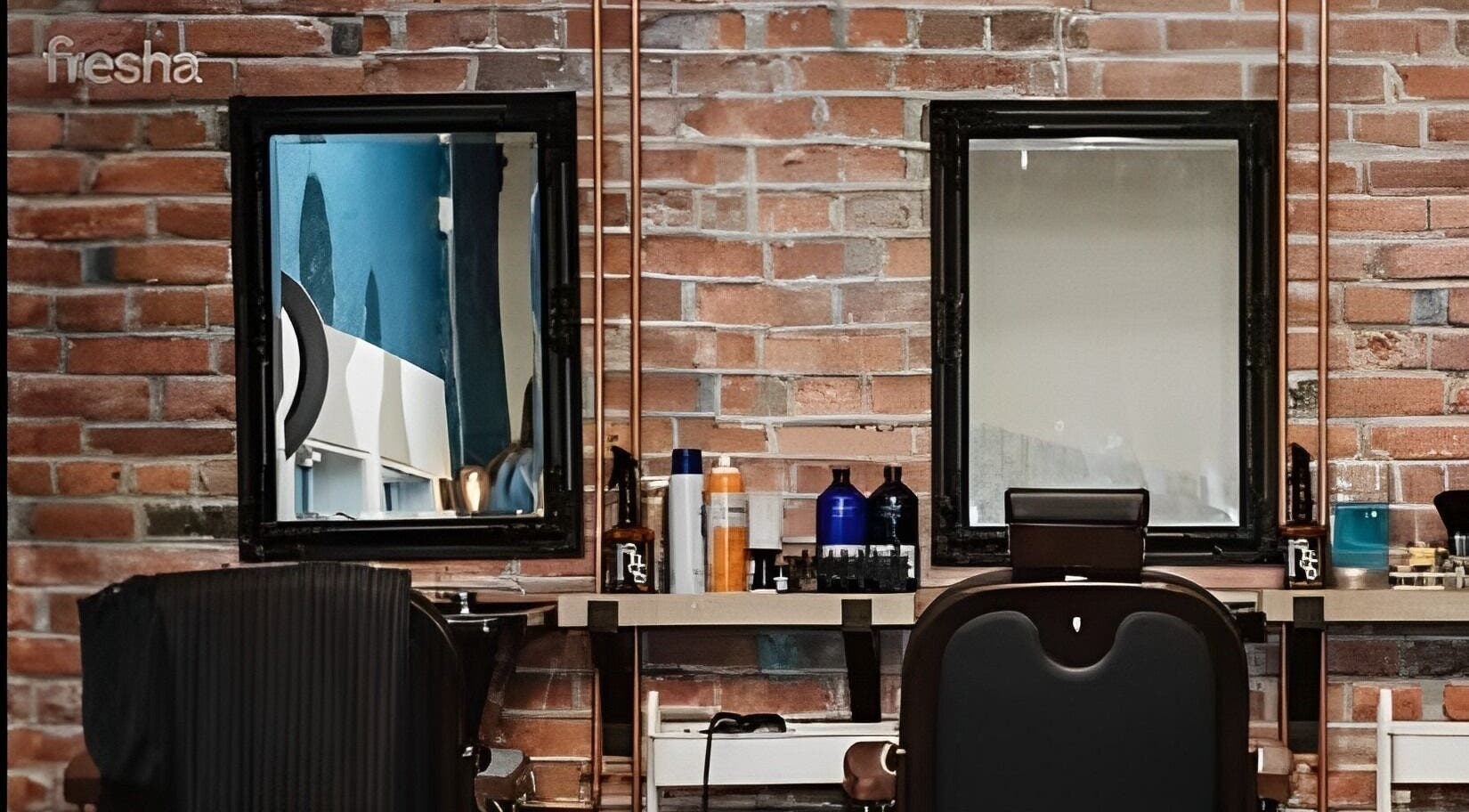 Chic urban barber station at Prohibition Barber & Bourbon Room, Canmore, Alberta, CA with exposed brick wall.