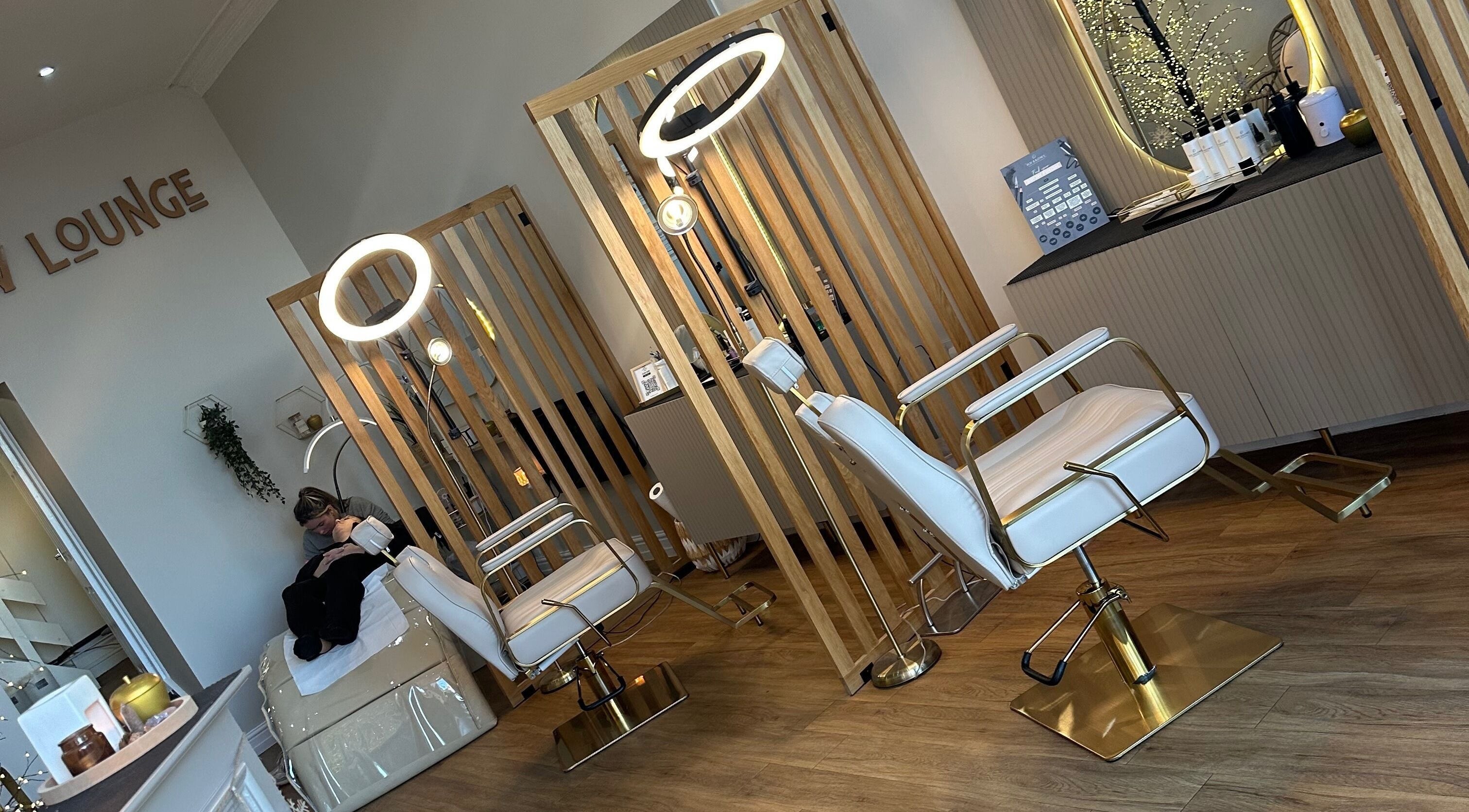 Chic interior of The Brow Lounge Aesthetics and Beauty, Bishop Auckland, England, GB, with modern styling chairs.