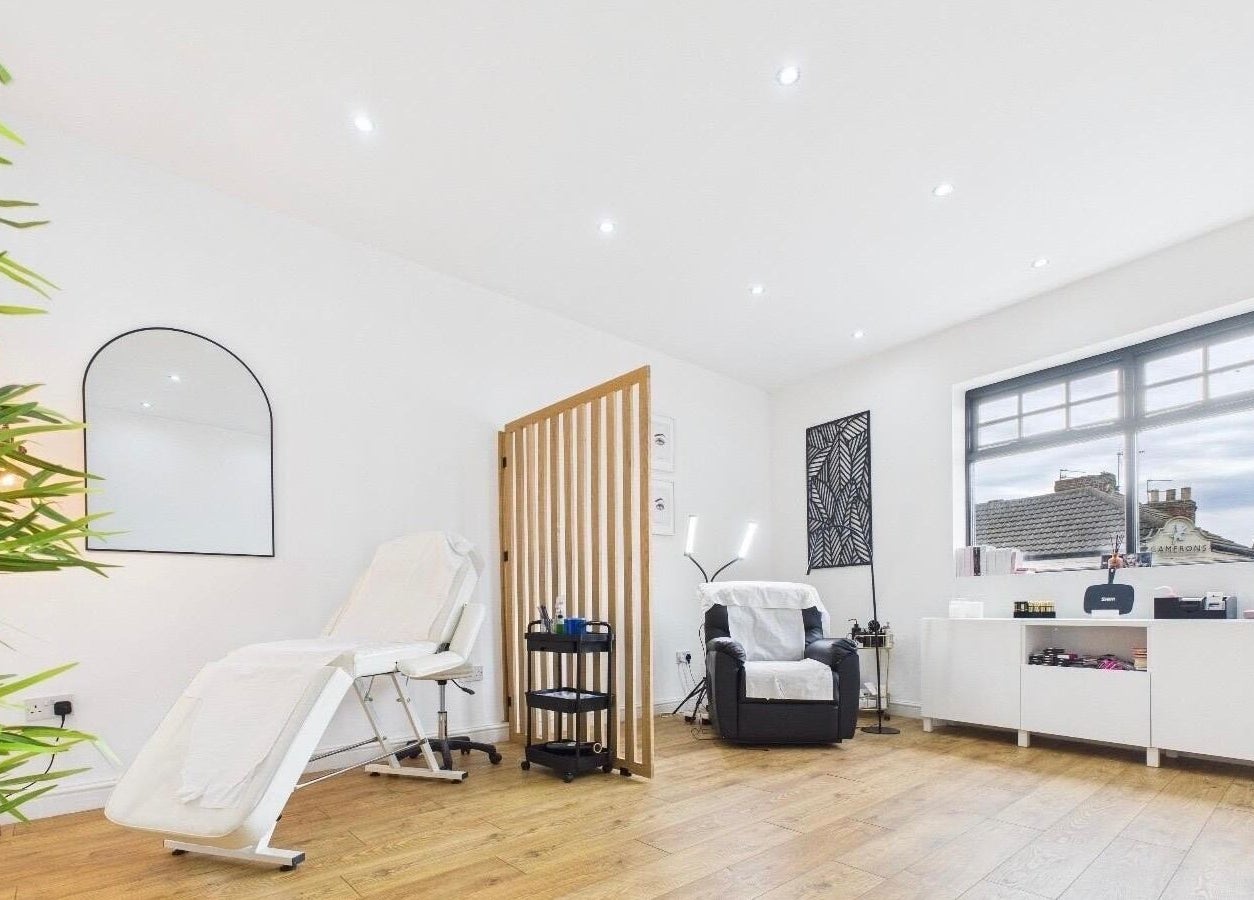 Calming treatment room at The Brow Lounge Aesthetics and Beauty, Bishop Auckland, England, GB with modern decor.