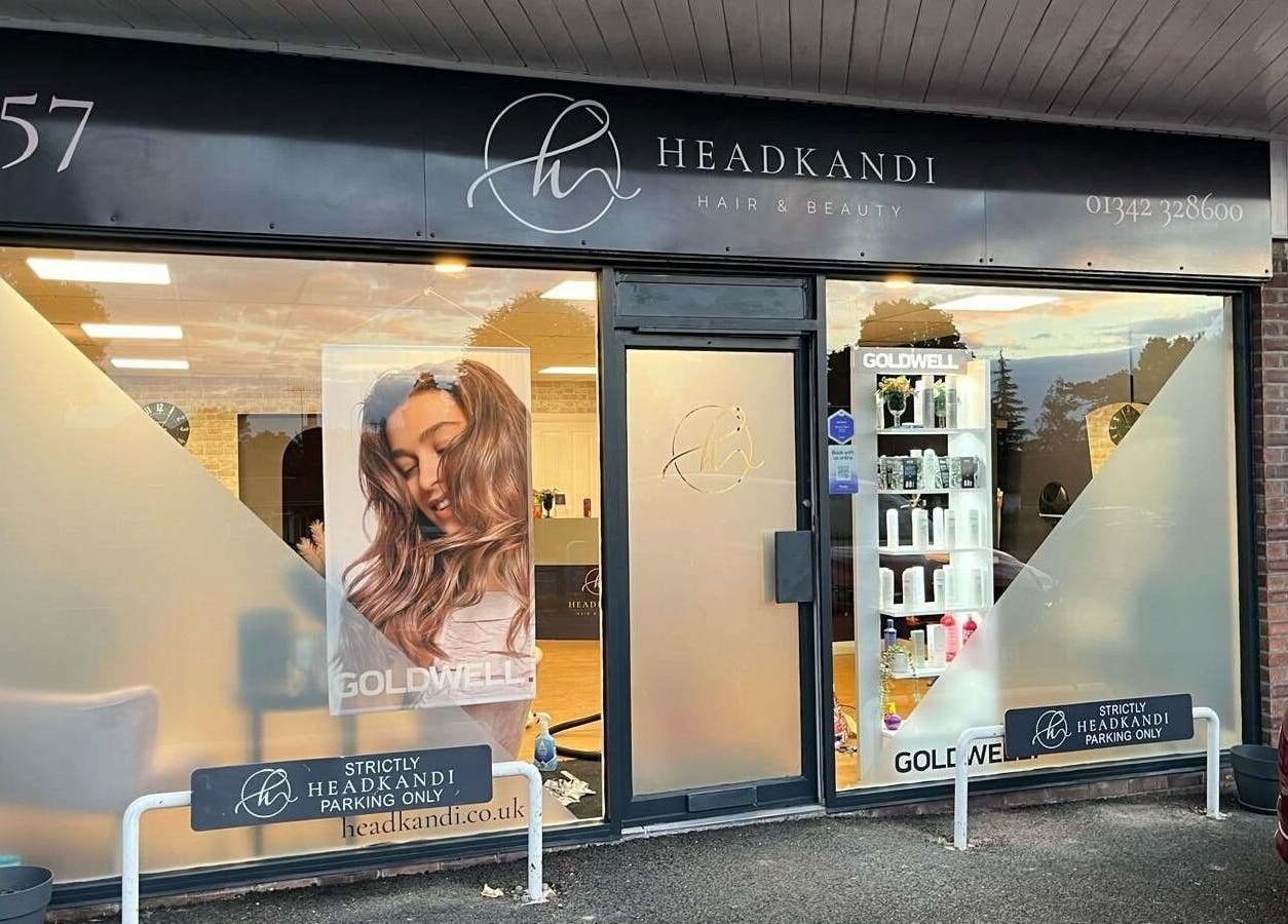 Exterior view of Mane Street Salon LLP in East Grinstead, England, GB showcasing modern design.