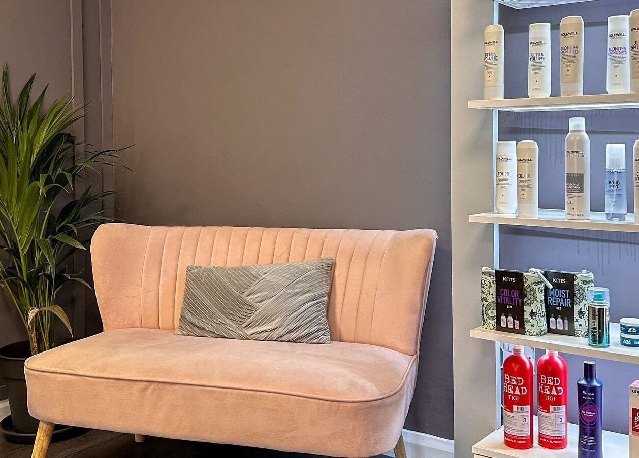Cozy seating with beauty products at Mane Street Salon LLP, East Grinstead, England, GB.