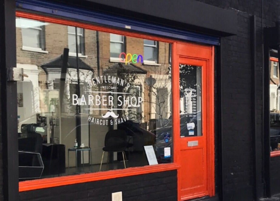 Front view of The Trimmers Wood Green, a vibrant barber shop in London, England, GB.