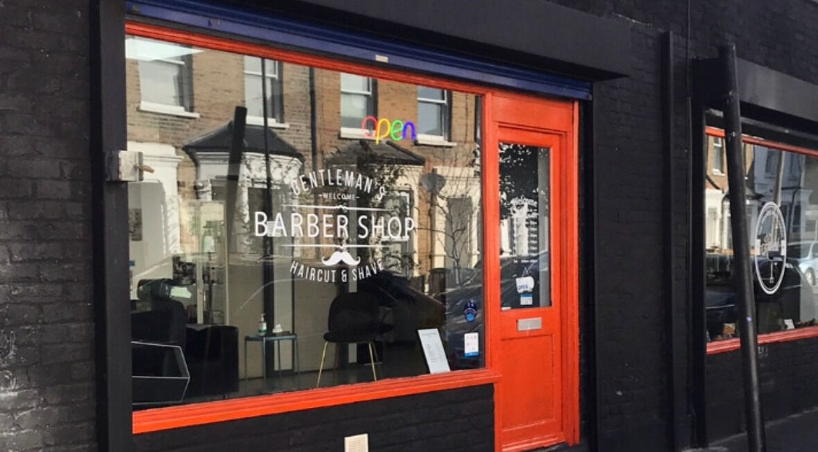 Front view of The Trimmers Wood Green, a vibrant barber shop in London, England, GB.