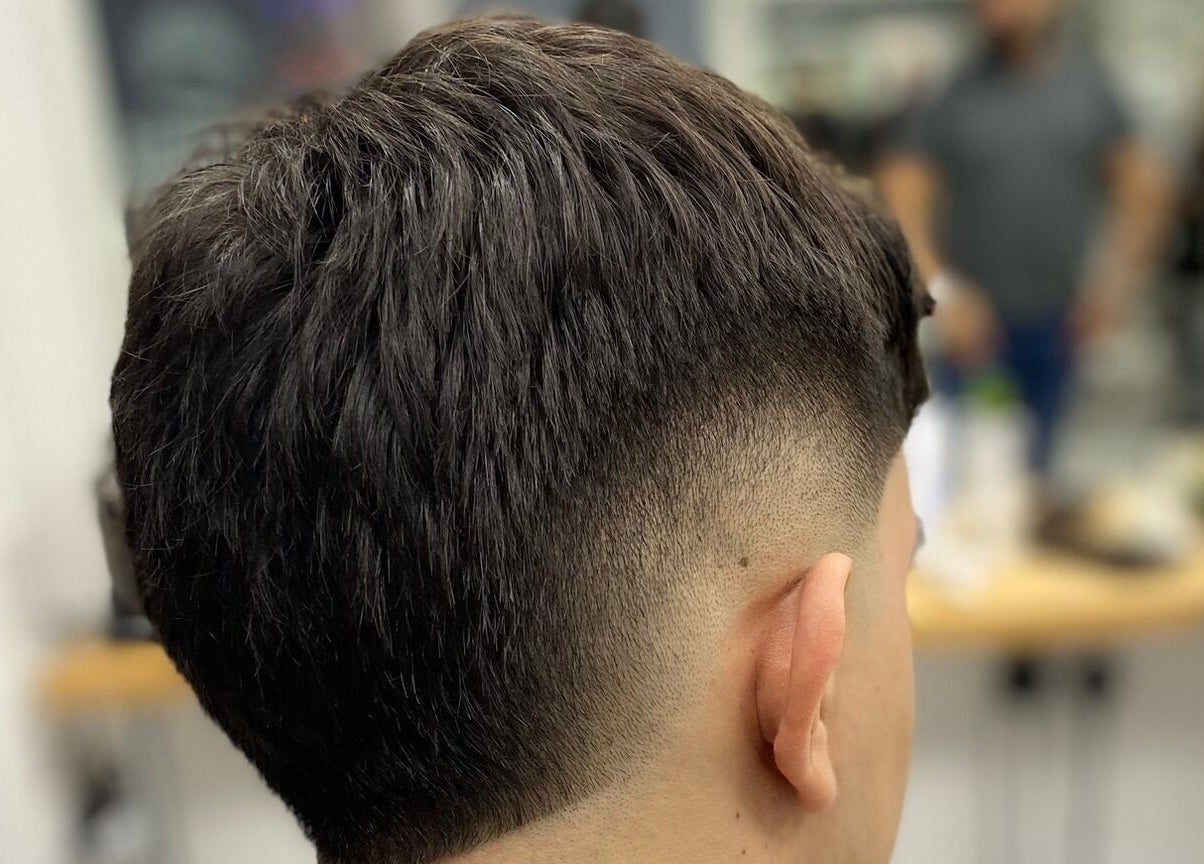 Close-up of a stylish fade haircut at The Trimmers Wood Green, London, England, GB.