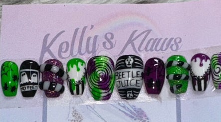 Unique Beetlejuice-themed nail art at Kelly's Klaws in Barrow-in-Furness, England, GB, showcasing vibrant designs.