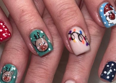 Festive nail art at Kelly's Klaws, Barrow-in-Furness, England, GB showcases holiday-themed designs.