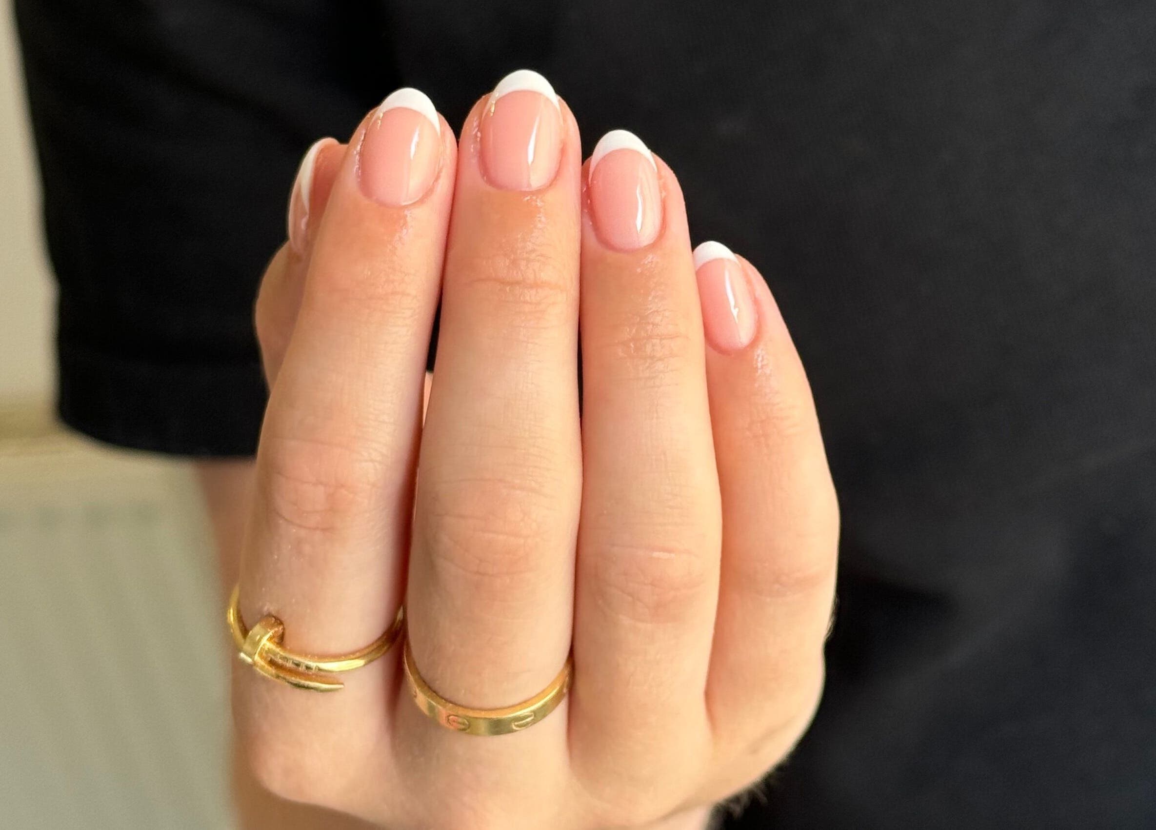 French manicure at Painted by Jade, Newtown, Wales, GB showcasing clean, elegant design.