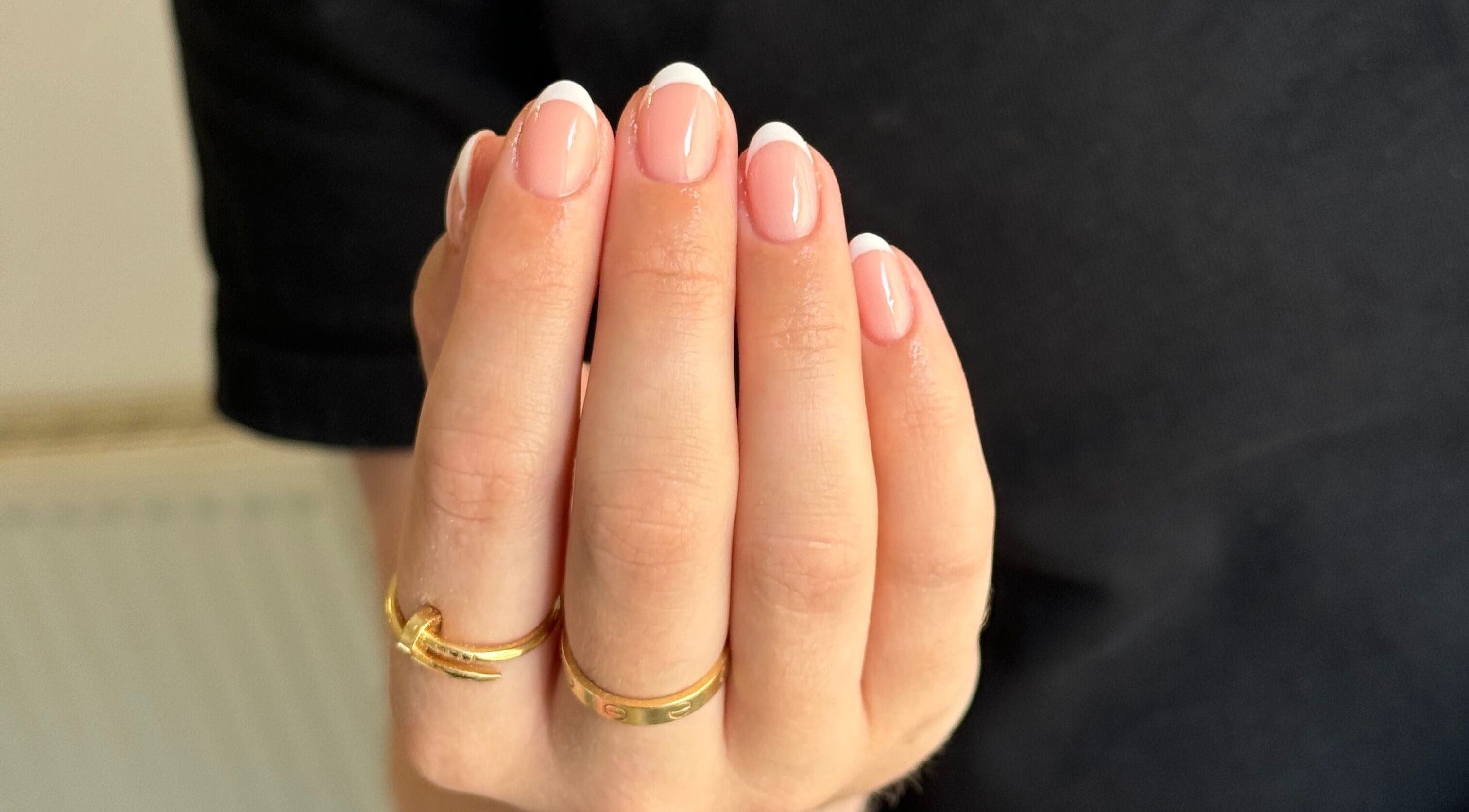 French manicure at Painted by Jade, Newtown, Wales, GB showcasing clean, elegant design.