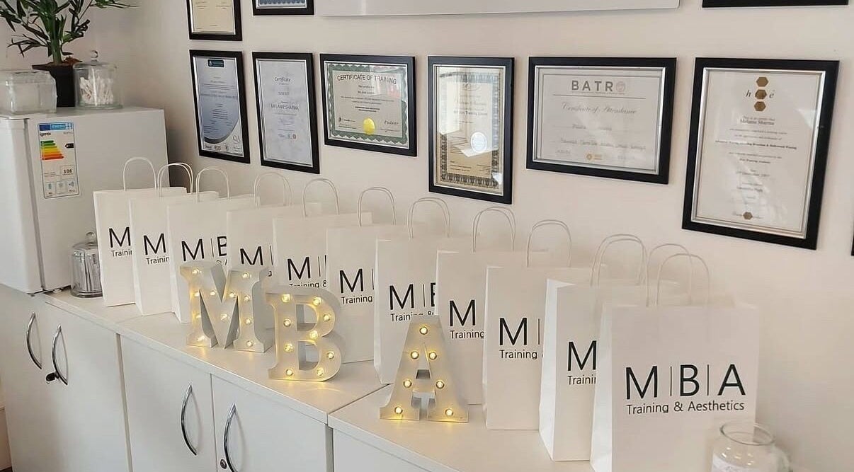 Certificates and gift bags at MBA Aesthetics & Training in Southampton, England, GB, showcasing professionalism.