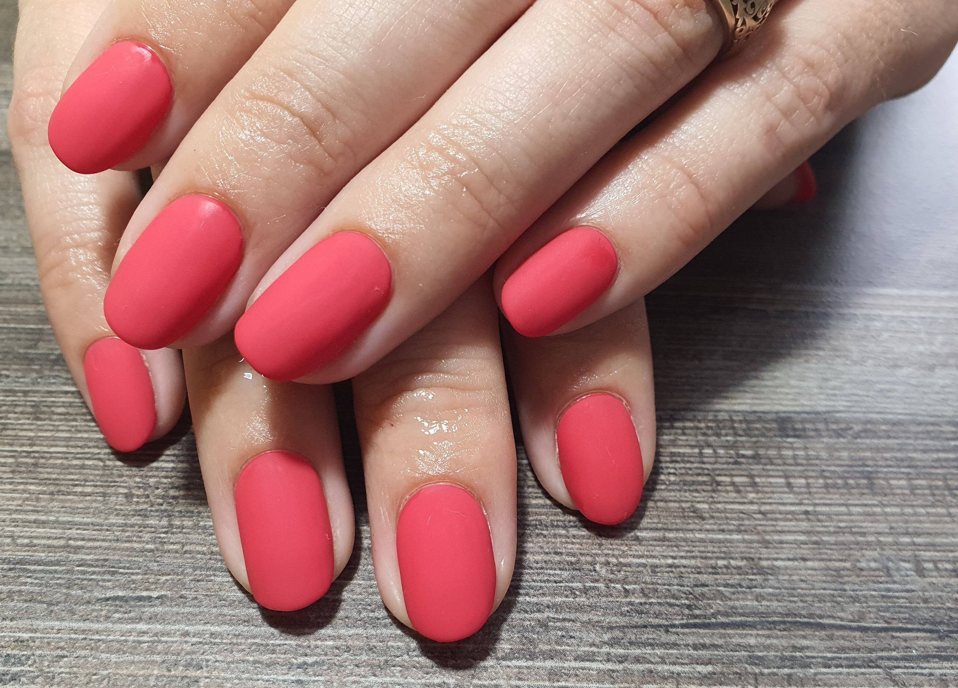 Stylish manicured red nails at Get Nailed Beauty Salon at Eclipse, Bloemfontein, Free State, ZA.