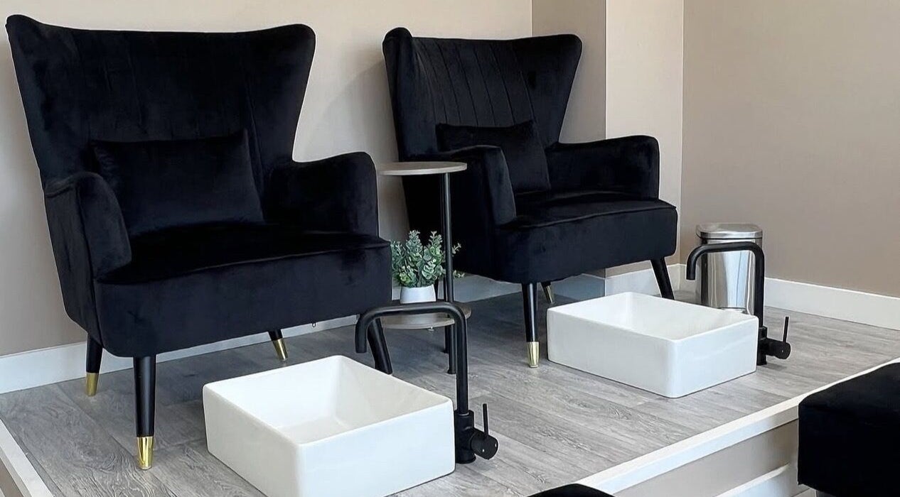 Luxurious pedicure chairs at Harmony Beauty Lounge, Bath, England, GB provide ultimate comfort and style.