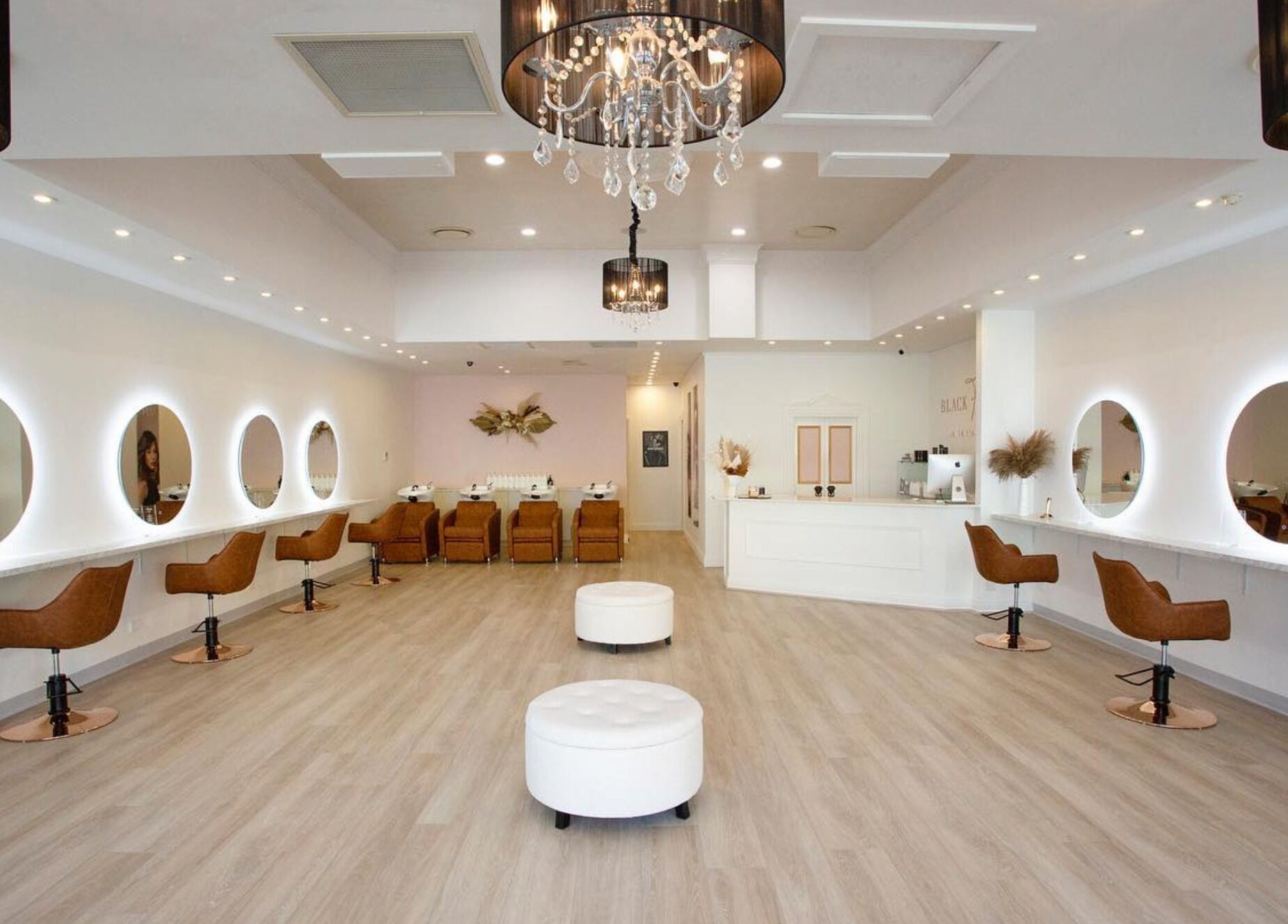 Elegant interior of Black Foxx Hair and Beauty in Charlestown, New South Wales, with chic design and seating.