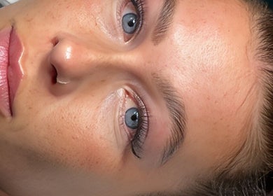 Close-up of a serene face receiving a beauty treatment at SLC Studio in Ash Green, England, GB.