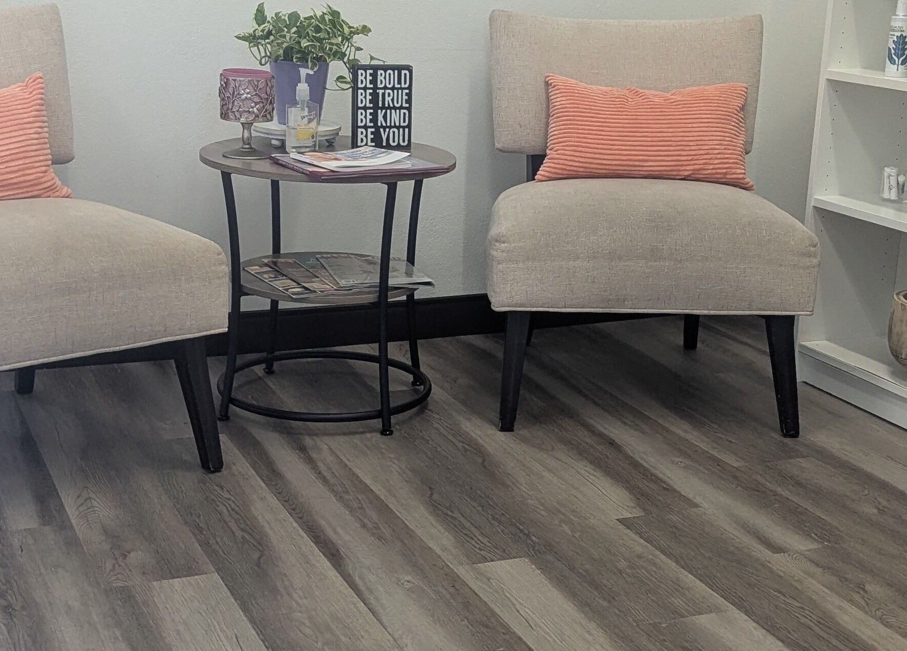 Calm waiting area at West Valley Aesthetics, Glendale, Arizona, US, with chairs and a side table.
