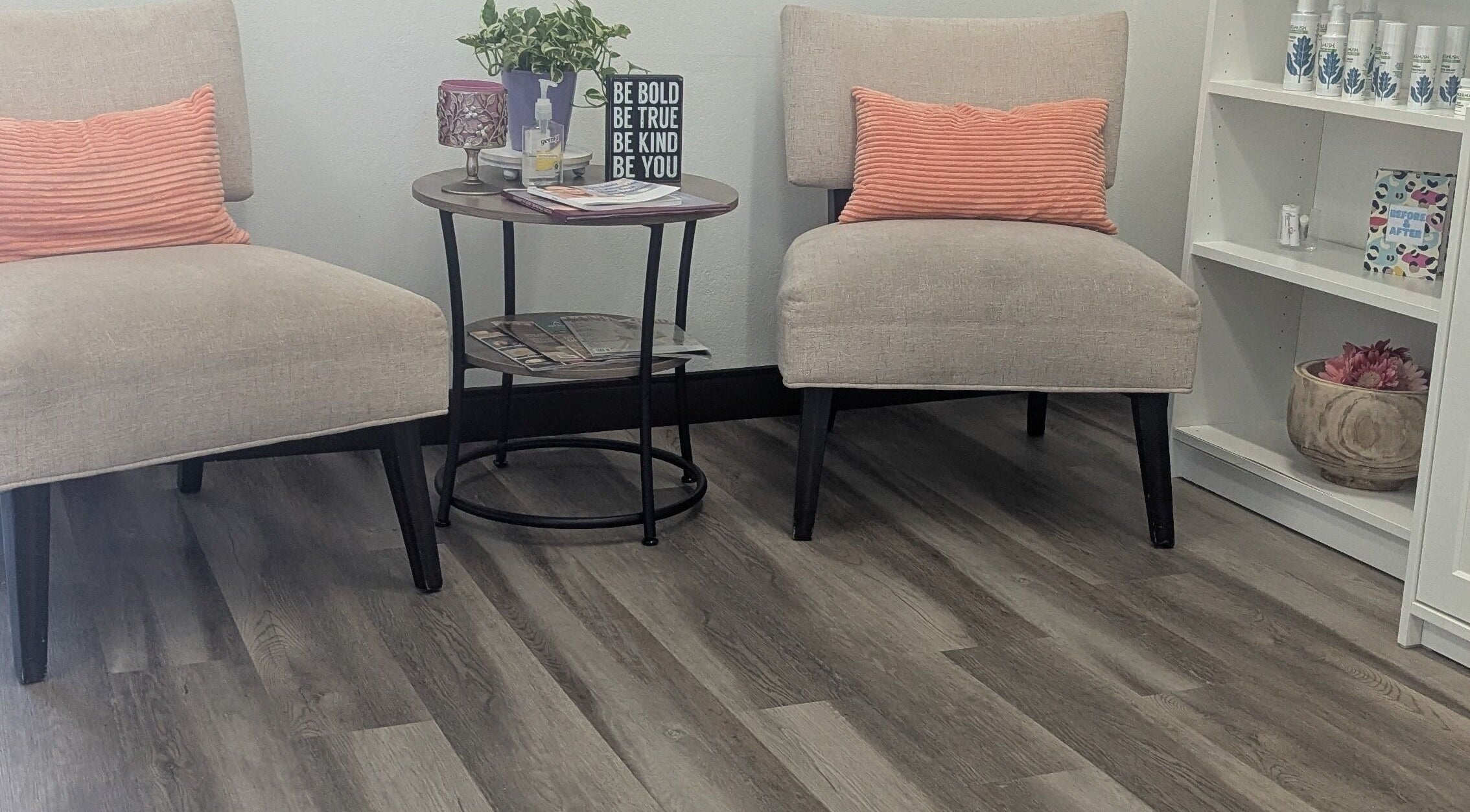 Calm waiting area at West Valley Aesthetics, Glendale, Arizona, US, with chairs and a side table.
