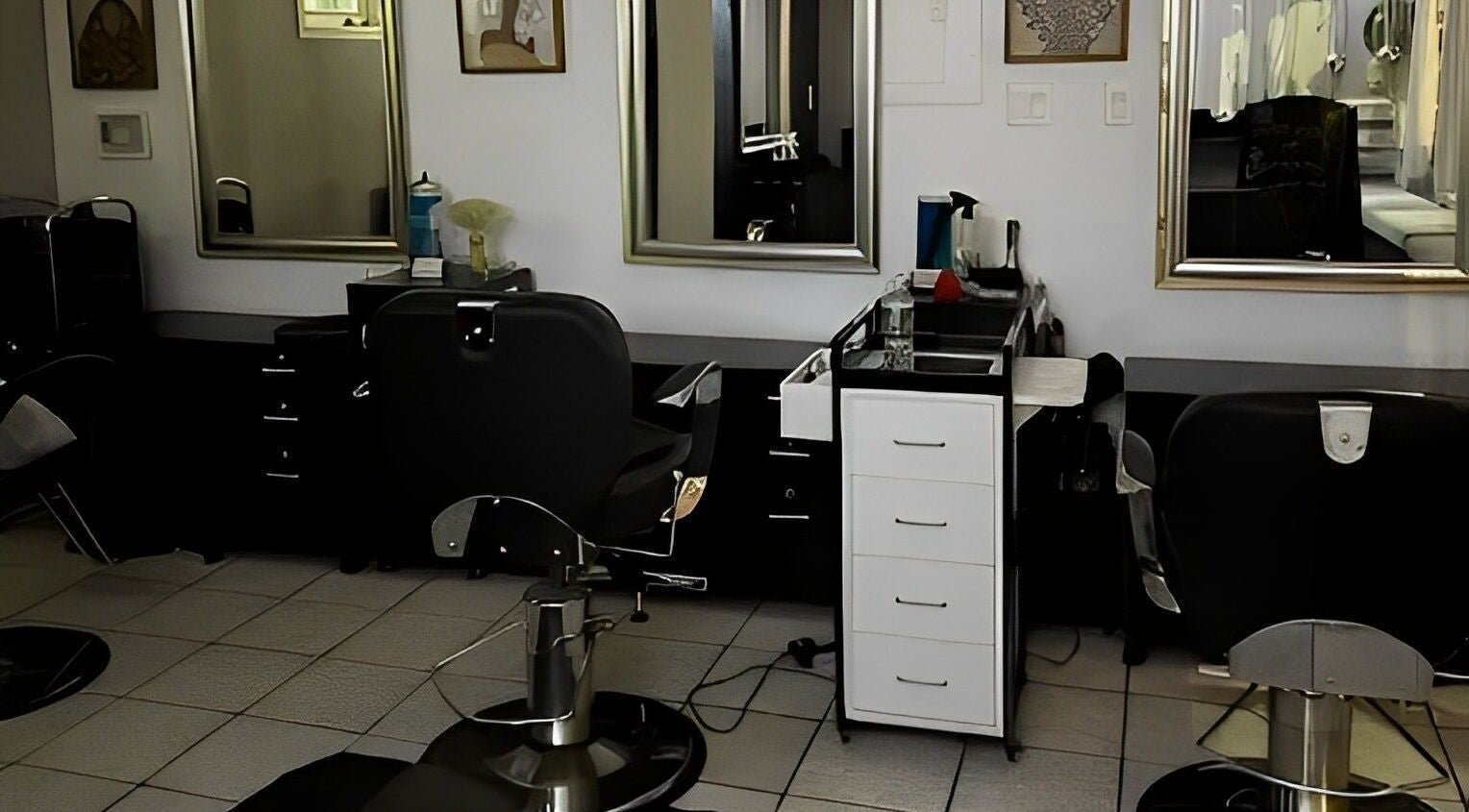 Modern interior of Crissel New York Hair Salon in Brooklyn, New York, US featuring stylish salon chairs.
