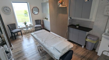 Inviting treatment room at North East Cosmetics [Easington Village] in Peterlee, England, GB featuring modern decor.