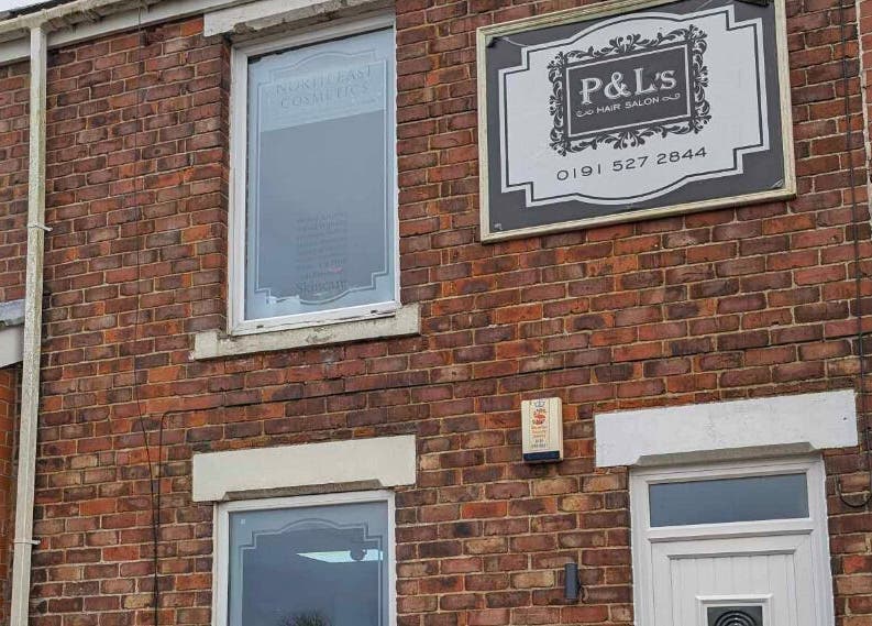 North East Cosmetics [Easington Village] exterior in Peterlee, England. Features a classic brick facade and signage.