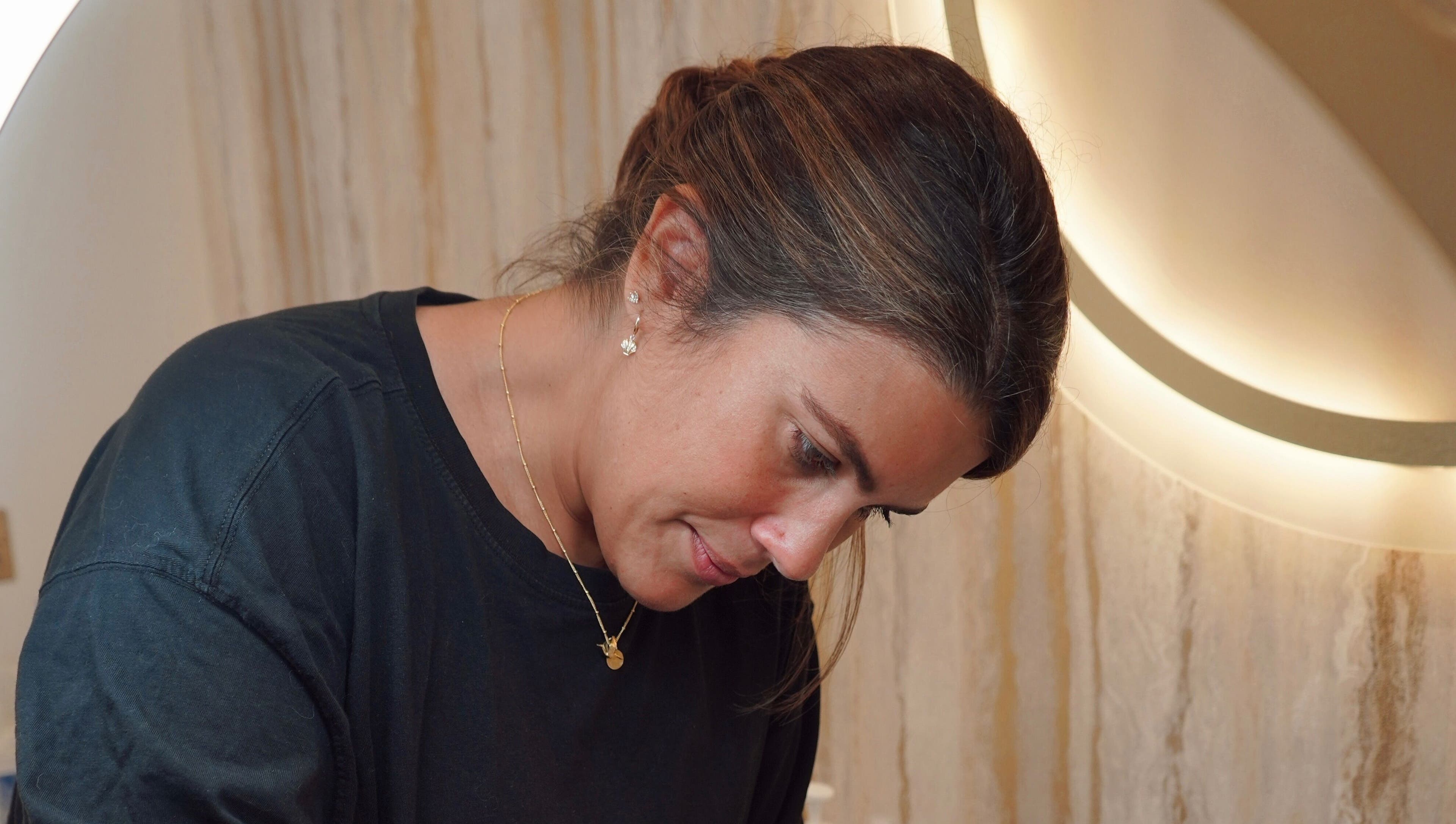 Skilled professional at Dr Meera Aesthetics - Brighton, Brighton And Hove, England, administering treatment.