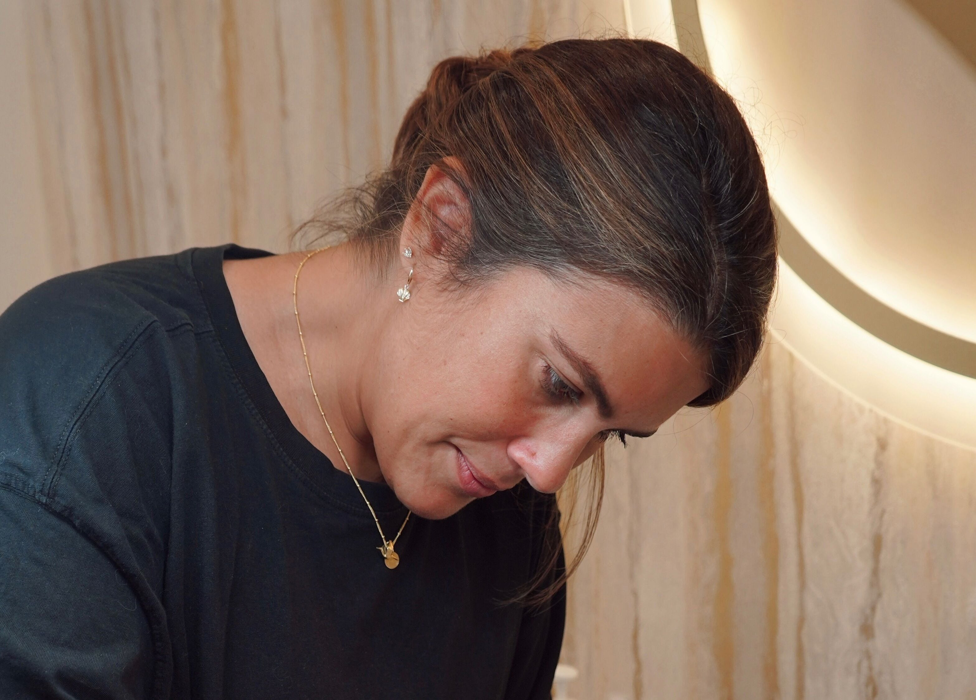 Skilled professional at Dr Meera Aesthetics - Brighton, Brighton And Hove, England, administering treatment.