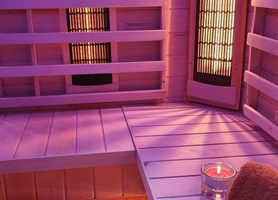 Relaxing infrared sauna at Evaiya Spa, Surfers Paradise, Queensland, AU with warm lighting and cozy ambiance.