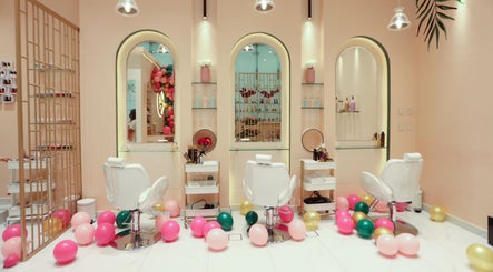 Elegant interior of Cuts and Nails Beauty Salon - Home Service in Dubai, AE with colorful balloons and stylish decor.