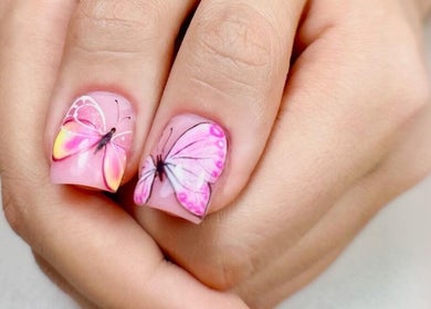 Elegant butterfly nail art at Cuts and Nails Beauty Salon - Home Service, Dubai, AE.