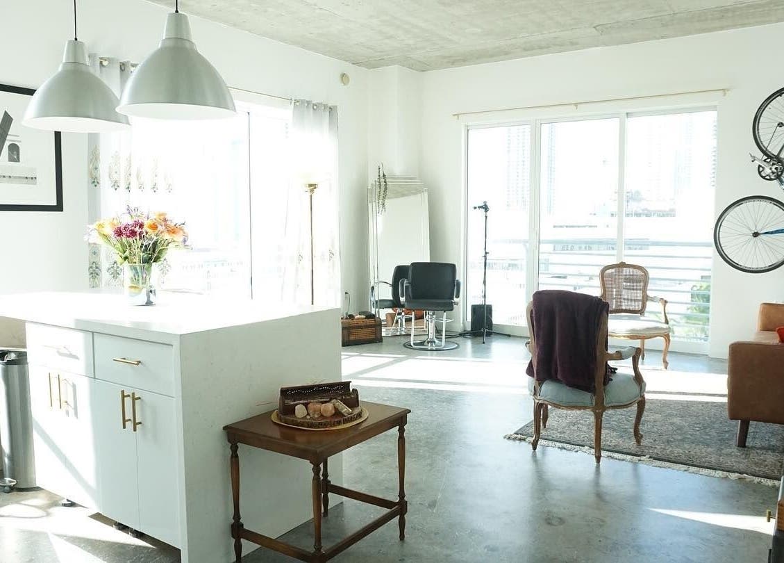 Sunlit interior of Sodada Salon in Miami, Florida, US featuring stylish decor and modern salon chairs.