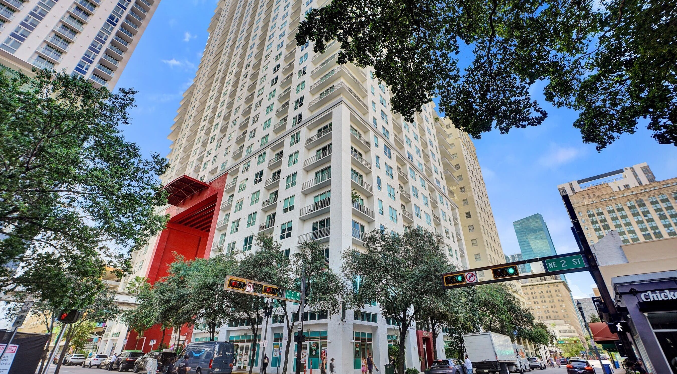 Street view of Sodada Salon in Miami, Florida, with modern high-rise surroundings.