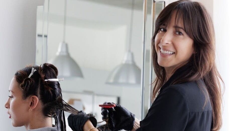 Professional stylist working with client at Sodada Salon, Miami, Florida, US, enhancing client experience.