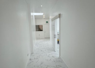 Minimalistic white hallway at House of Glam HQ, Portsmouth, England, GB.
