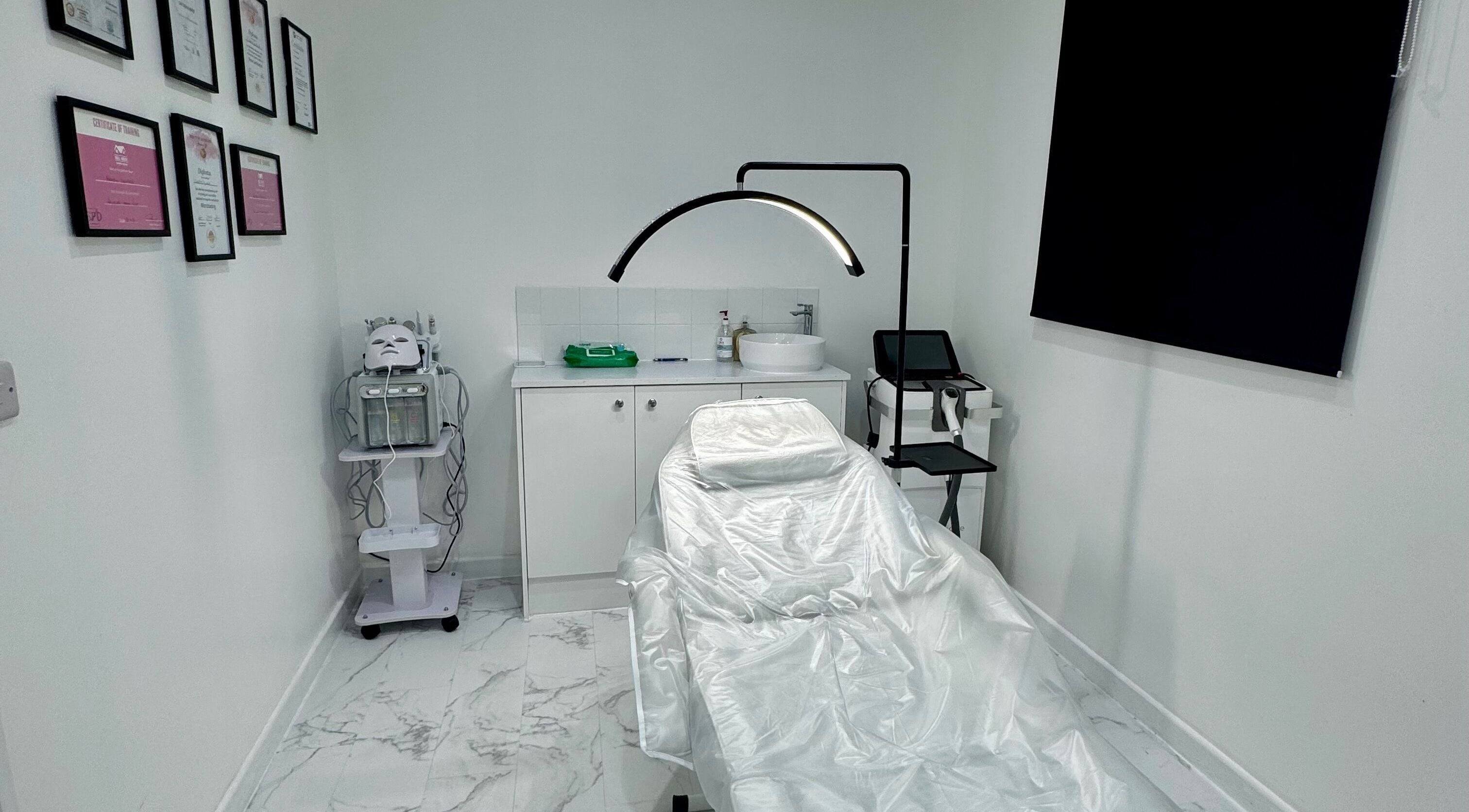 Elegant treatment room at House of Glam HQ, Portsmouth, England, GB. Features spa bed and skincare equipment.