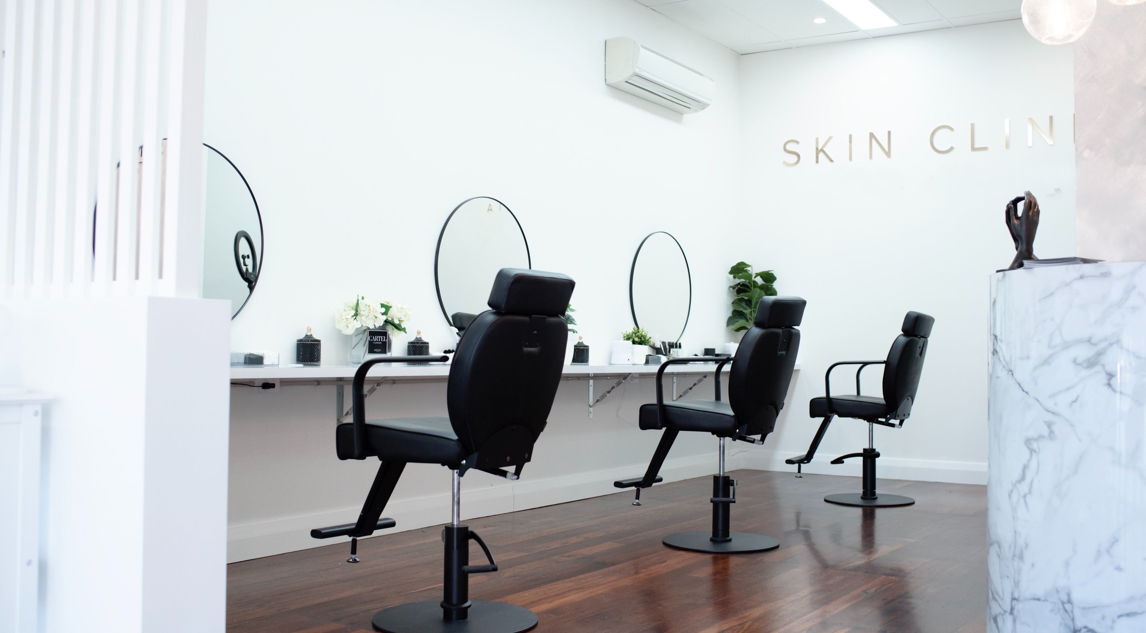 Stylish interior of Skin Room Perth with modern chairs and mirrors in Mount Lawley, Western Australia, AU.