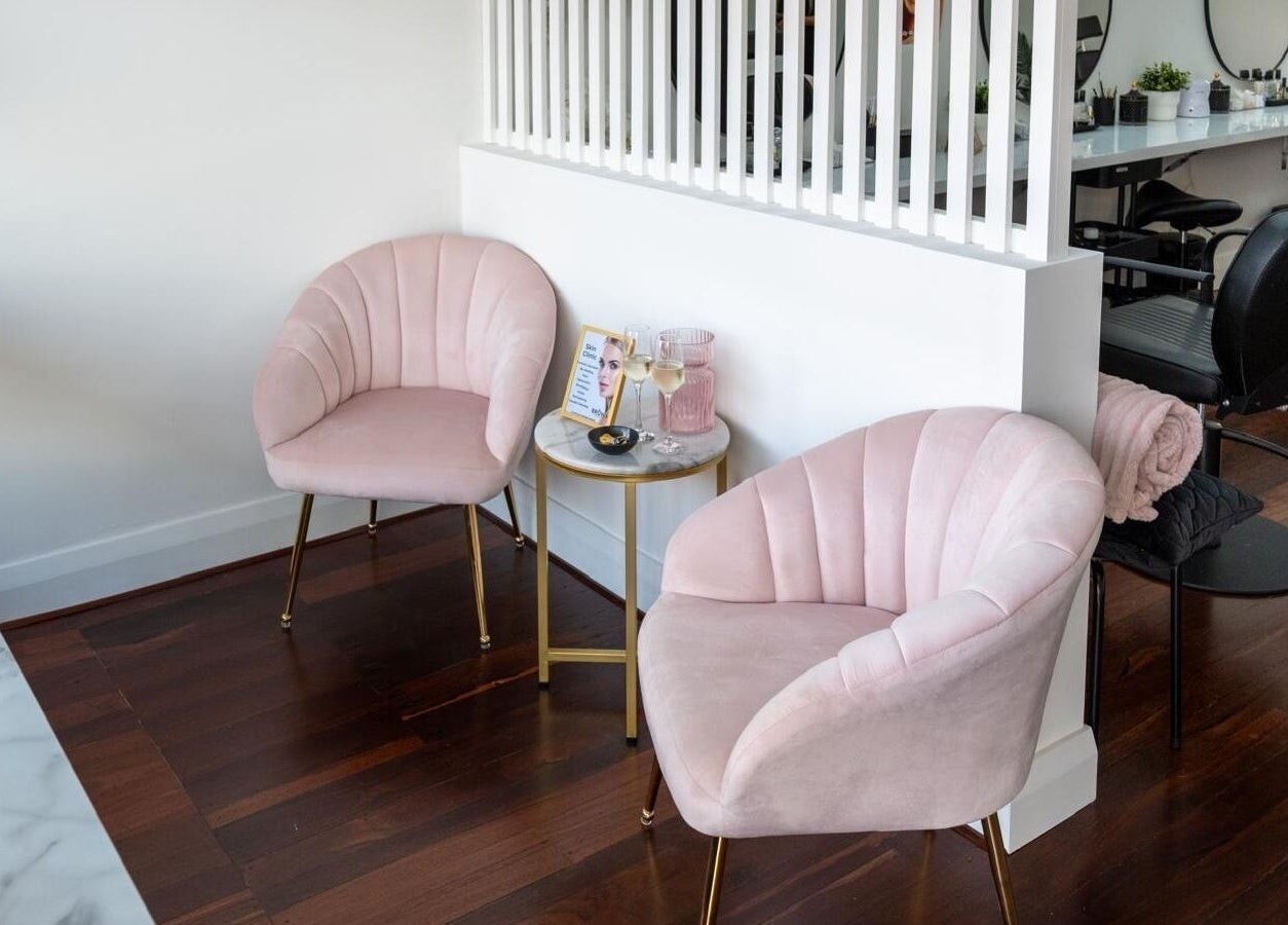 Elegant seating area at Brows Australia - Launceston with plush pink chairs in Launceston, Tasmania, AU.