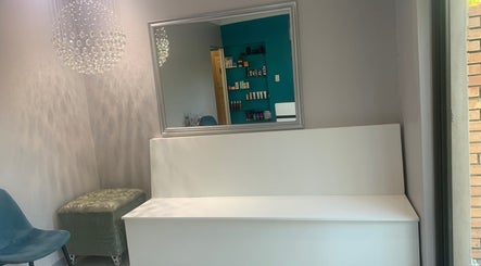 Elegant waiting area at Eloah Aesthetic Clinic & Salon - Rooihuiskraal, Centurion, Gauteng, ZA with stylish decor.