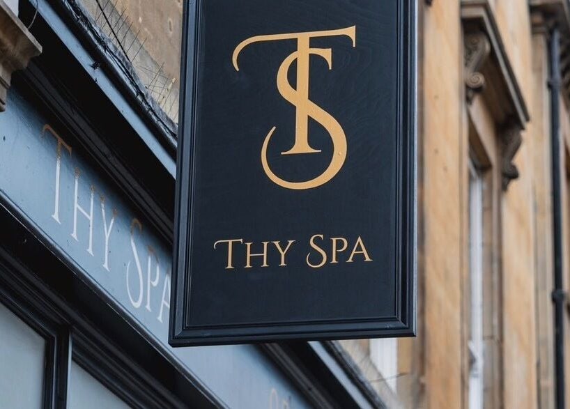 Thy Spa Bath's elegant signage displayed on the building exterior in Bath, England, GB.